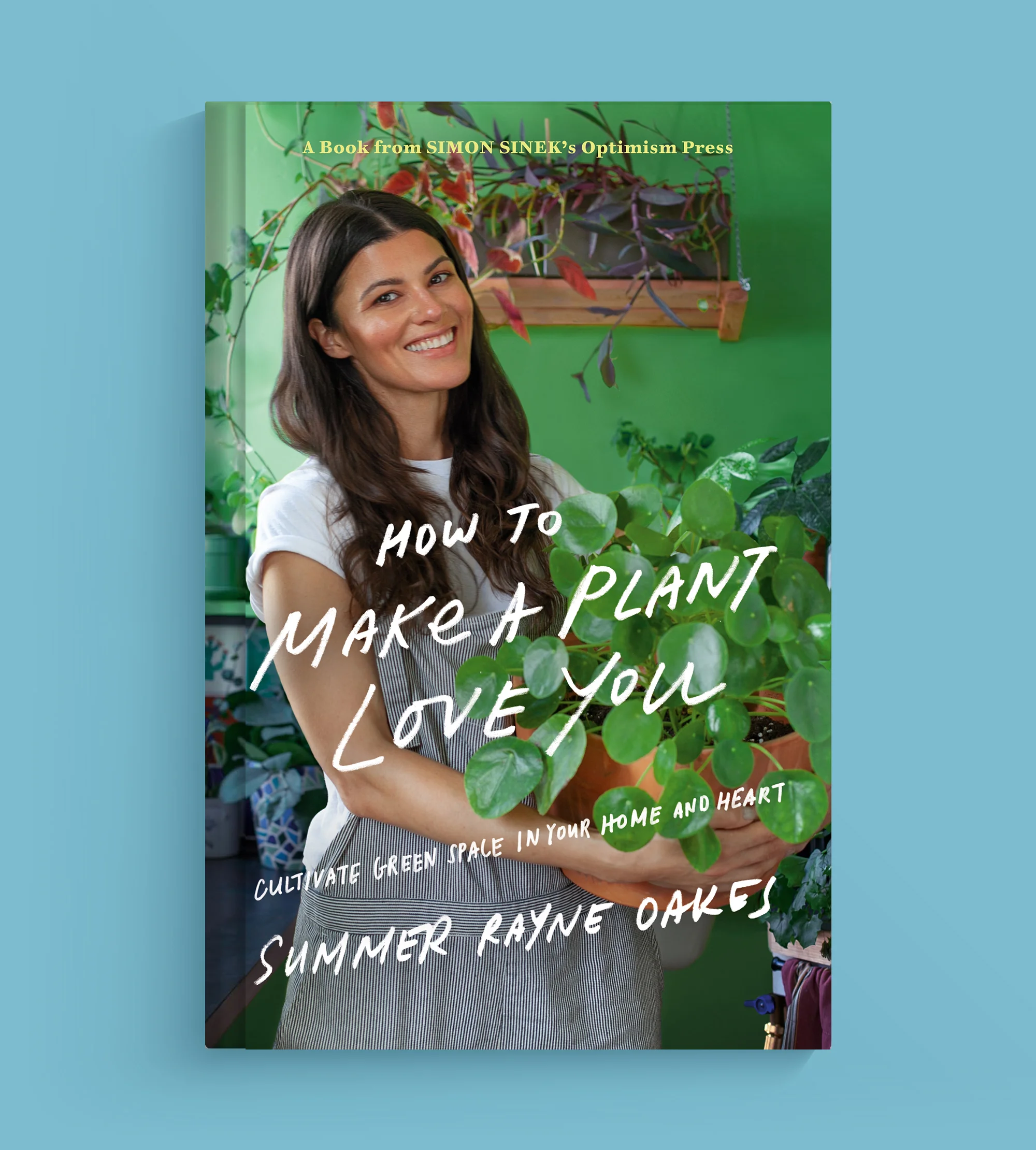 How to Make a Plant Love You by Summer Rayne Oakes, photographed against a blue background